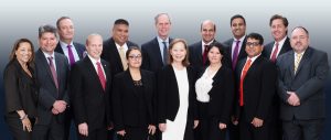 Wong Fleming partners from left to right: Tacita Mikel Scott, Hector Noriega, Jens Kindt, Jordan Charness, Noel Yumo, Ramina Dehkhoda-Steele, Daniel C. Fleming, Linda Wong, Rehan Alimohammad, Martha Villalobos, Tariq Zafar, Shahzad Qadri, Scott Stevenson, James Haney
